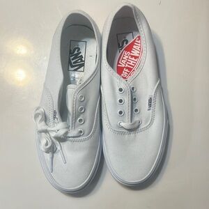 Canvas white vans